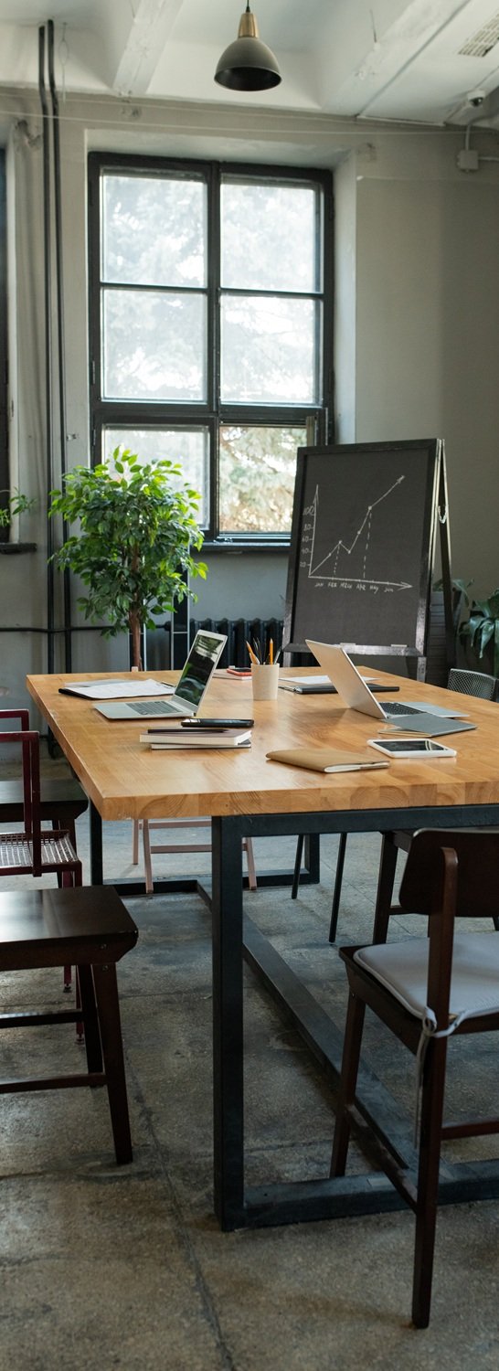 Interior of large modern office with table and chairs in the center